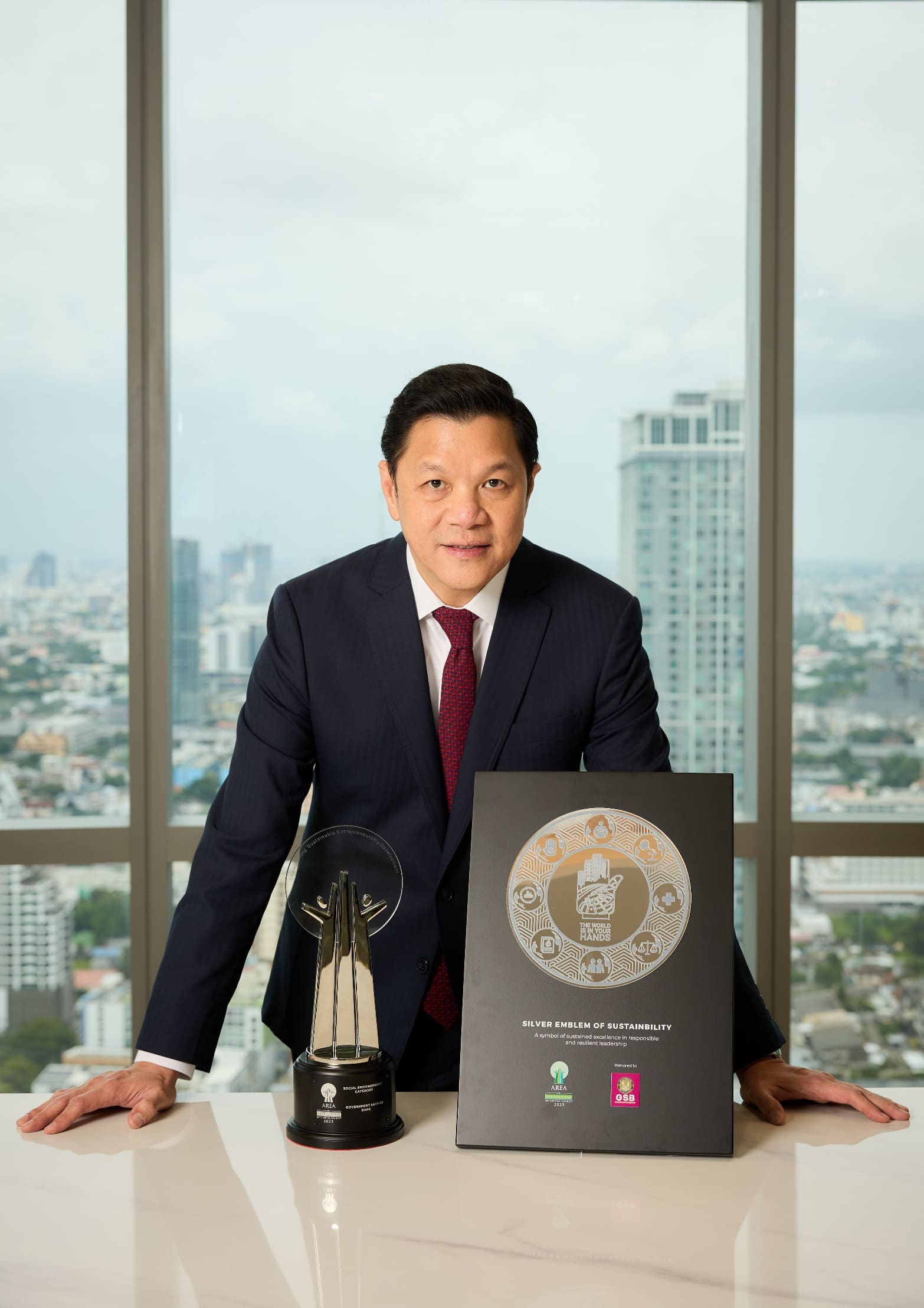 ออมสิน คว้า 2 รางวัลระดับเอเชีย AREA 2025 “Silver Emblem of Sustainability” และ “Social Empowerment”
ตอกย้ำบทบาท Social Bank ผ่านนวัตกรรมความปลอดภัย MyMo Secure Plus